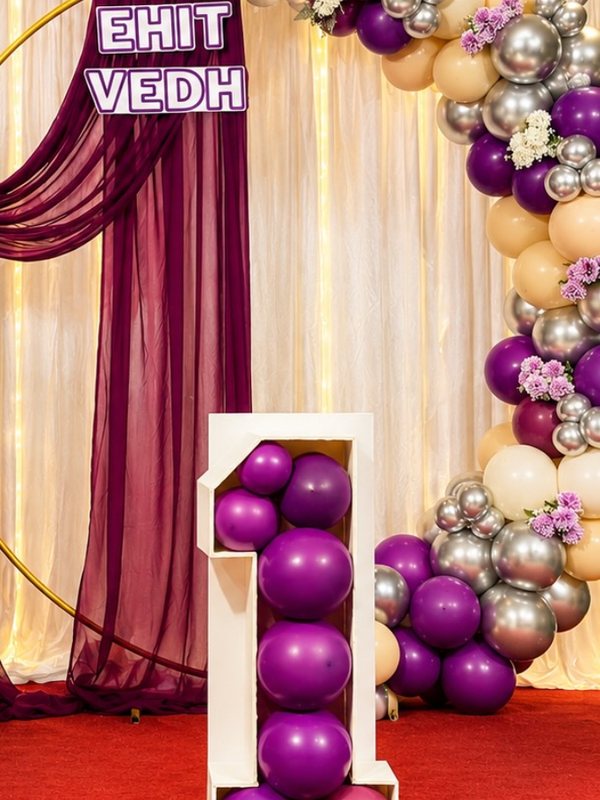 Purple and silver balloon ring arch